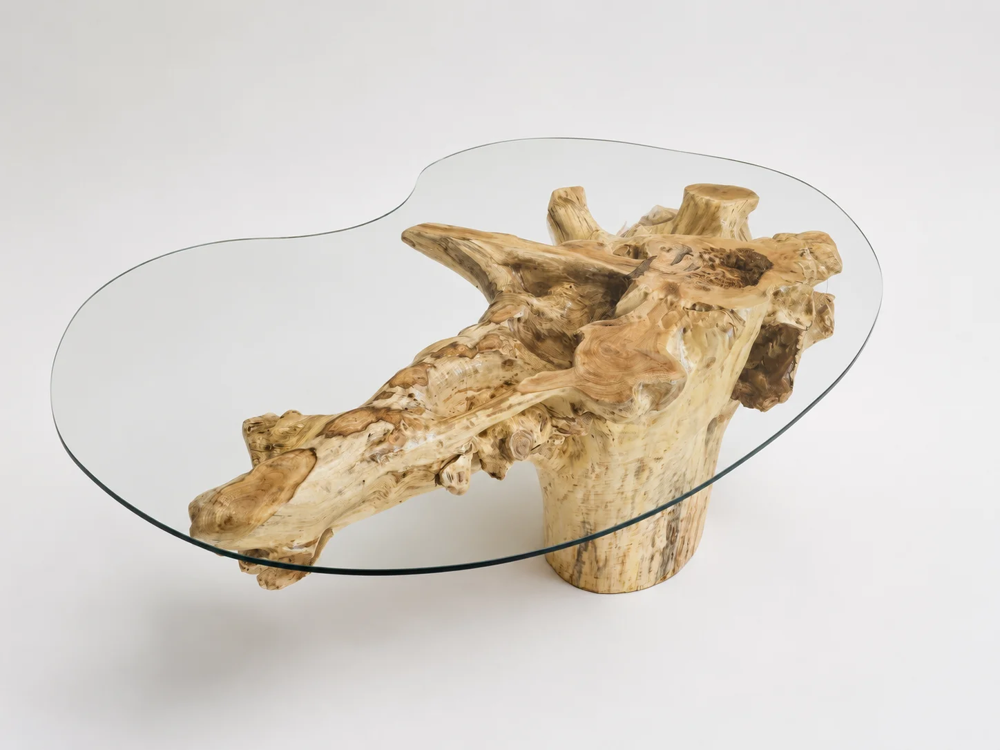 The grain and natural shape of a handcrafted wooden table